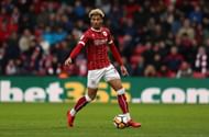 Former Bristol City left back Lloyd Kelly could help to shore up Bournemouth's leaky defence